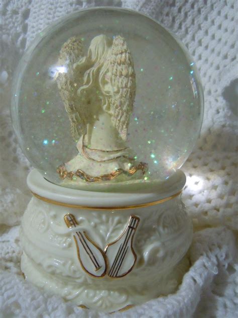 electric angel music box|angel snow globe music box.